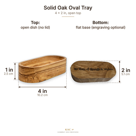 Solid oak oval tray size guide: 4 in long, 2 in wide, 1 in tall; flat base on the bottom, engraving optional